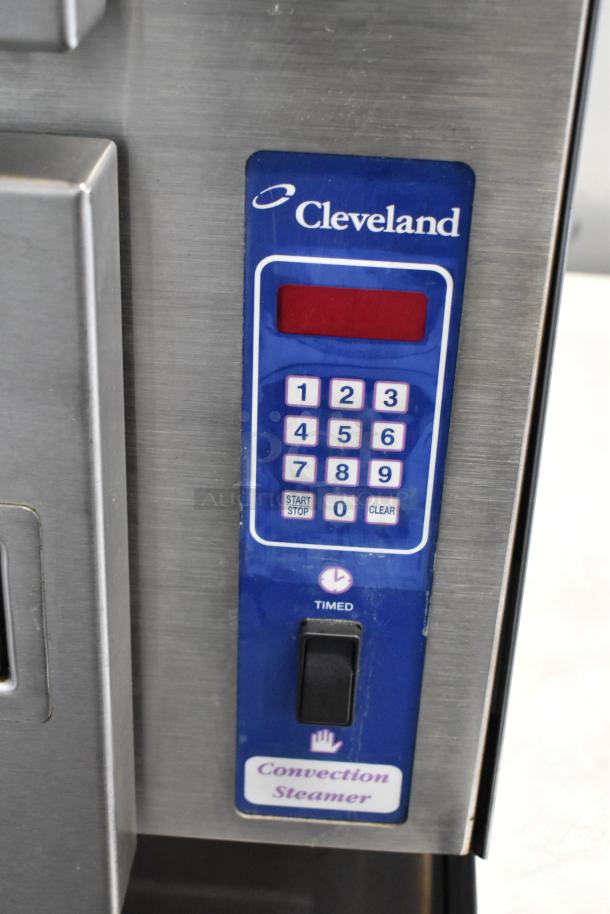 Cleveland 24CGM200 stainless steel commercial natural gas 2 deck convection steam cabinet, 200,000 BTU, control panel shown.