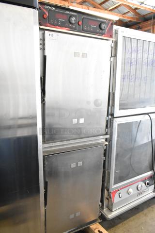 CresCor 1000CHSS2DE stainless steel heated holding cabinet, 2 half-size doors, top door won't open, on commercial casters.