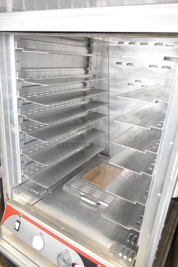 BevLes PHC70-MP17INS metal heated holding cabinet proofer with shelves, commercial casters, and control panel; 120 volts.