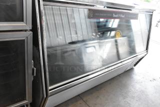 Leader HDL96 S/C deli display case, metal construction, floor style, 115V, 1 Phase, Boar's Head branding, used condition.