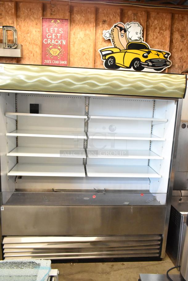 True TAC-72-RC open grab-n-go merchandiser, metal floor style, 115V, 1 phase. Features adjustable shelves, clean condition.