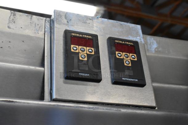 Traulsen AD232W-ZAB27 control panel showing Intela-Traul digital displays for freezer and refrigerator settings.