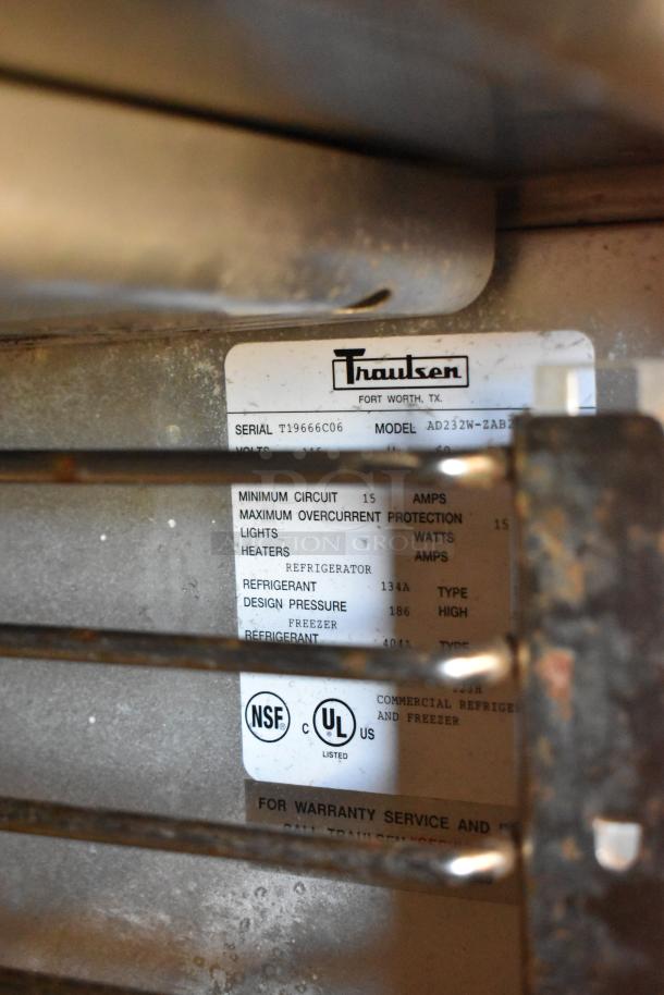 Traulsen AD232W-ZAB27 stainless steel two-door reach-in cooler and freezer label, 115V, 1 phase. Doors need attachment.
