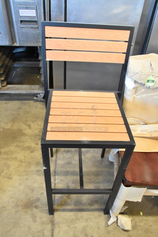 Three new chairs including two black metal bar-height with wooden slats and one wooden dining-height, slight scratches visible.