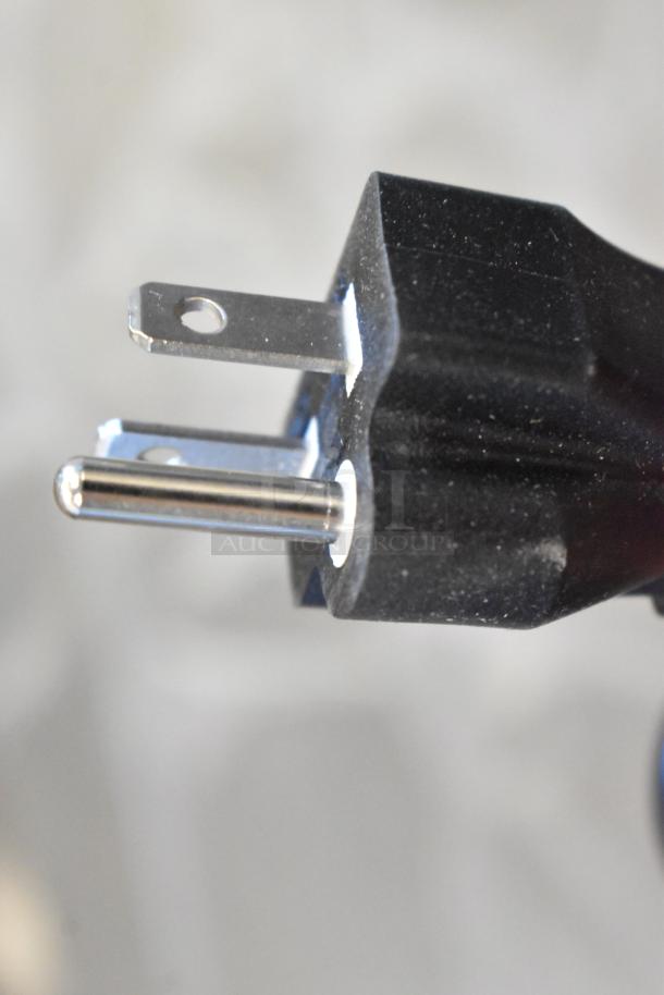 Close-up of a standard three-prong plug. Part of Avantco 177EG24N electric countertop griddle. Brand new, 208/240 Volts, 1 Phase.