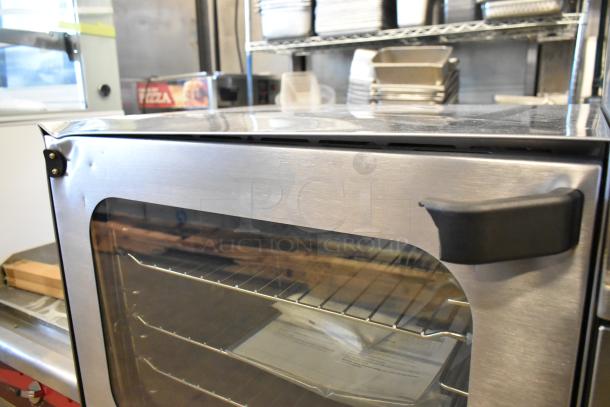 Brand new scratch and dent Vollrath COV-208240-HS stainless steel countertop convection oven, 208-240V, 1 phase.