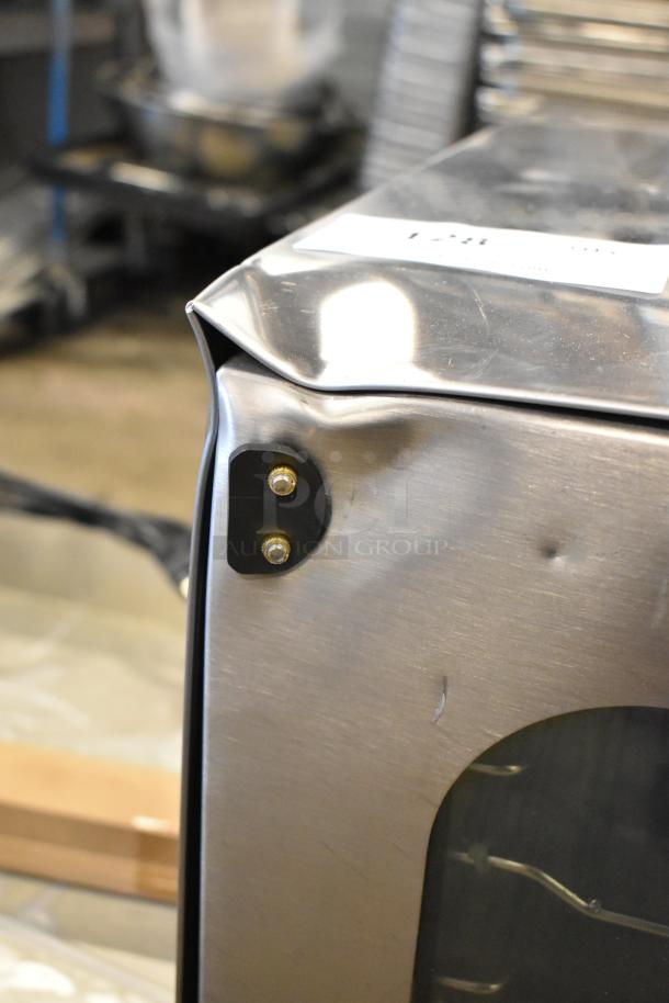 Brand new 2025 Vollrath COV-208240-HS stainless steel convection oven with visible dents on the top edge.
