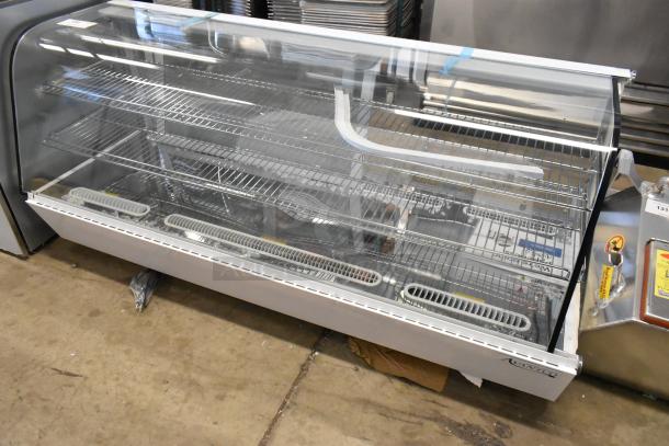 Brand new Avantco 360BCC60HCW 60" white refrigerated bakery display case, LED lighting, visible glass damage, 115V, 1 phase.