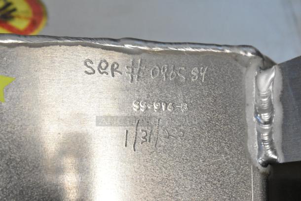 Brand new Shortening Shuttle SS-914 Waste Oil Transport Container. Visible markings: serial number, model, date.