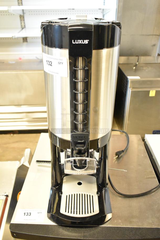 BRAND NEW Fetco Luxus LGD-20 2-Gallon Stainless Steel Coffee Dispenser with Stand, minor scratches and dents.
