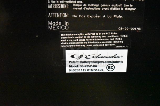BRAND NEW Schumacher SE-2352-CA Battery Charger, made in Mexico, scratch and dent condition, model SE-2352-CA label visible.