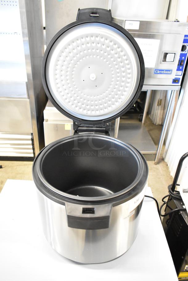 Brand new 2024 Galaxy 177RWGB90 90 cup electric rice warmer, 120 volts, 1 phase, open lid, stainless steel with minor dent.