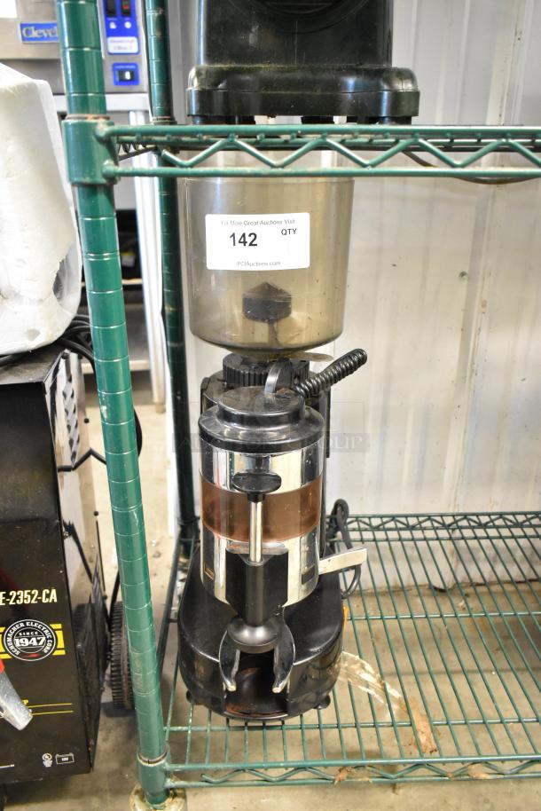 Rossi RR45 metal commercial countertop espresso bean grinder, missing lid, 115 volts, 1 phase, auction tag 142 visible.