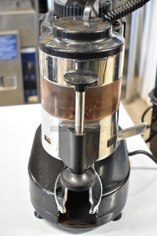 Rossi RR45 metal commercial espresso bean grinder, missing lid, in used condition. 115 volts, 1 phase.