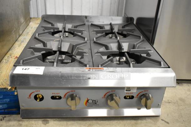 BRAND NEW Cooking Performance Group R-CPG-24-NL, 4-burner stainless steel gas range, 88,000 BTU, minor scratches.