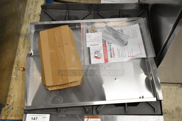 BRAND NEW Cooking Performance Group 4 Burner Stainless Steel Gas Range, model 351RCPG24NL, 88,000 BTU, scratch and dent, in original packaging.