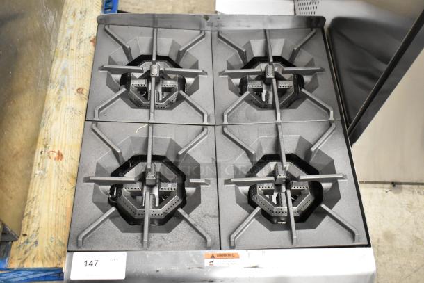 BRAND NEW Cooking Performance Group R-CPG-24-NL stainless steel 4 burner natural gas range, 88,000 BTU, small dent.