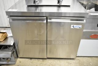Brand new Avantco 178SSUC36FHC stainless steel undercounter freezer, 36", two-door, 115V, with minor scratches.