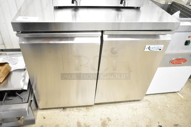 BRAND NEW Avantco 178SSUC36FHC 36" stainless steel 2-door undercounter freezer, 115V, 1 phase, slight dents visible.
