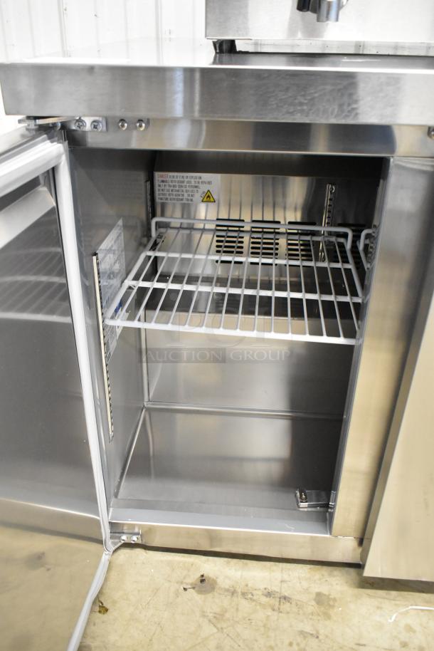 BRAND NEW Avantco 178SSUC36FHC 36" stainless steel 2-door undercounter freezer, with visible labels. 115V, 1 phase.