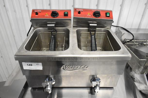 Brand new Avantco 177F202 30 lb. dual tank electric countertop fryer, includes 2 metal fry baskets and lids, 208-240V, 1 phase.