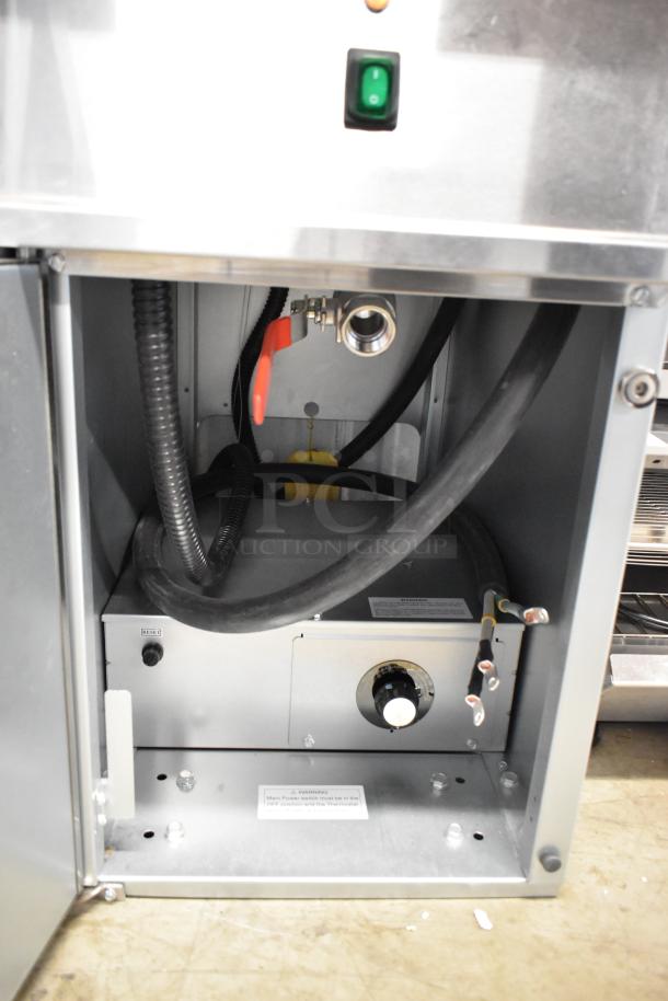 Brand new Avantco 177EF40D stainless steel deep fryer, 240V, floor style, with control panel and interior components.