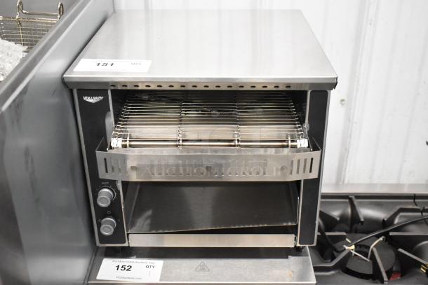 Brand new Vollrath JT1 conveyor toaster, 1 1/2" opening, 120V, 1 phase, minor scratches, dual control knobs visible.