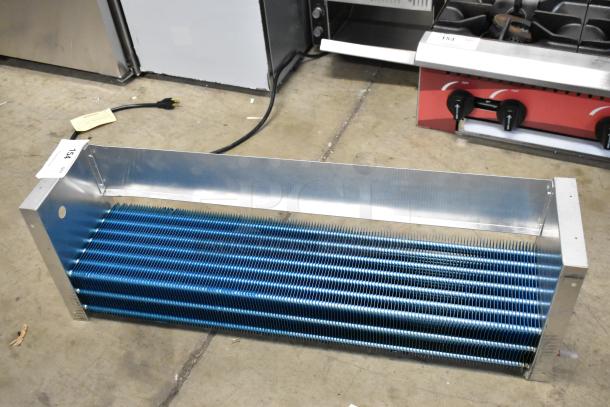 BRAND NEW SCRATCH AND DENT! SDKH 5R7K745L evaporator coil, metallic blue fins, minor surface imperfections, labeled "154".