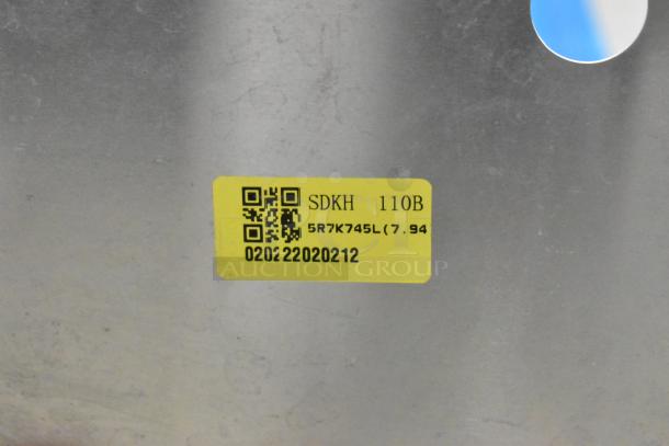 BRAND NEW SDKH 5R7K745L Evaporator Coil, scratch and dent condition, yellow label with model details, no visible damage.