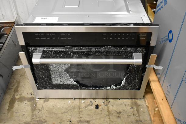 Brand new KoolMore KM-CWO24-SS stainless steel convection oven with microwave; glass damage visible on the door.