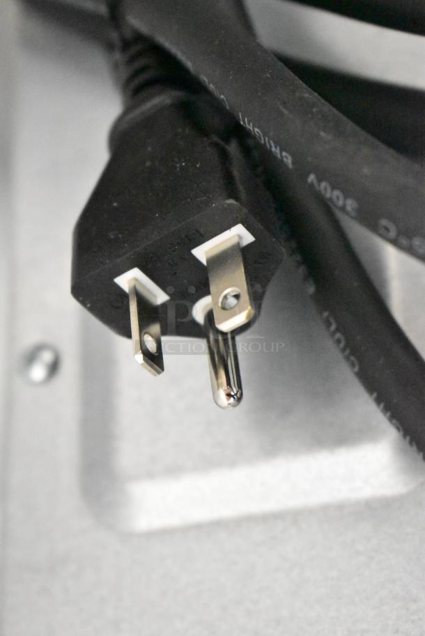 Close-up of a power plug and cord for KoolMore KM-CWO24-SS 24 in. Stainless Steel Convection Oven with Microwave.