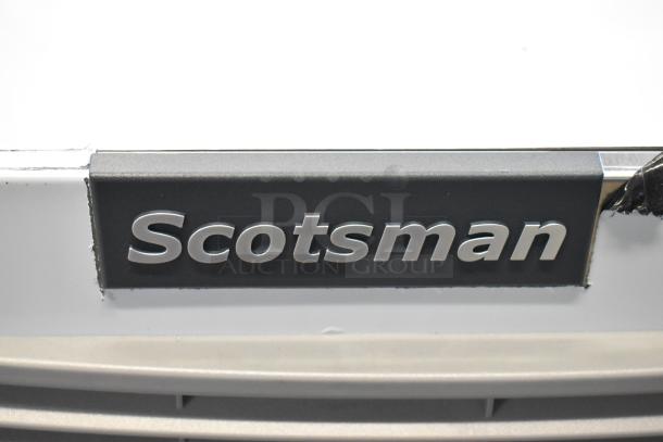 Close-up of Scotsman logo on a 2024 MC1030MA-32A Prodigy Elite® ice machine. Brand new, slight scratch visible.