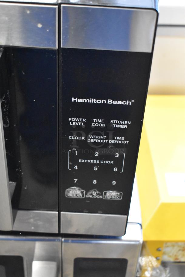 2025 Hamilton Beach HB8436127995-03 microwave oven in black; features keypad, power level, and timer options; 120 volts, 1 phase.