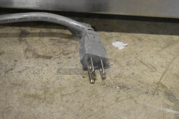 Plug of a 2016 Amana RCS10TS stainless steel commercial microwave, 120 volts, 1 phase.