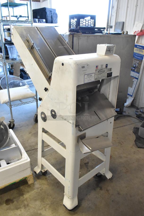 Oliver 797-32NC metal bread slicer on casters, 115 volts, 1 phase, used condition, commercial floor model.
