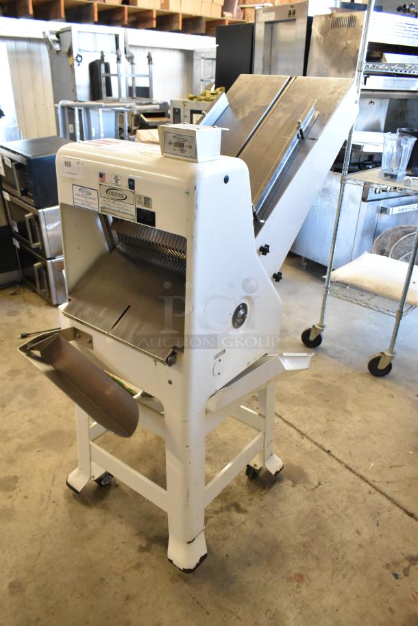 Oliver 797-32NC commercial bread slicer on casters, 115V, 1 Phase. Features metal construction and visible operation labels.