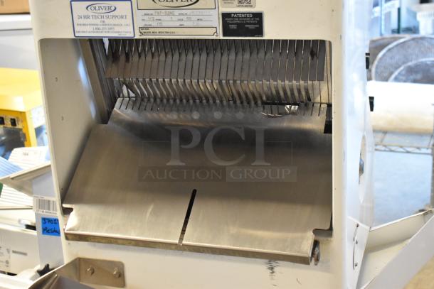 Oliver 797-32NC commercial bread slicer, floor style with metal blades, on casters; features labels with model and support info.