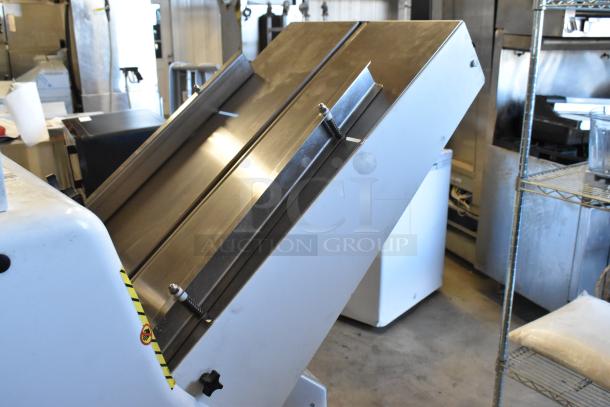 Oliver 797-32NC metal commercial bread loaf slicer on casters, 115V, excellent condition for bakery use.