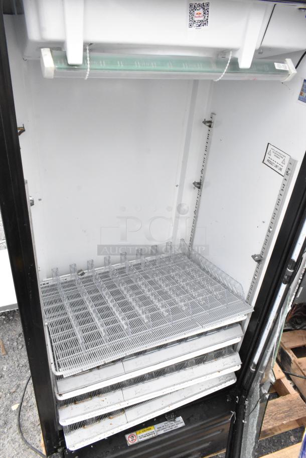 Imbera VR10 commercial cooler with poly-coated racks, glass damage visible. Single door, 115V, 1 phase.