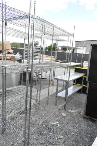 Chrome finish 3-tier wire shelving unit, sturdy metal design, outdoor setting. Buyer must dismantle, consider freight.