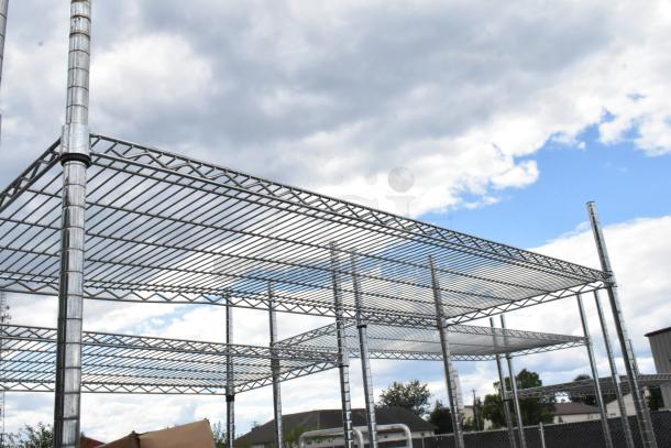 Chrome finish 3 tier wire shelving unit, industrial grade, requiring dismantling for transport, suitable for heavy storage.