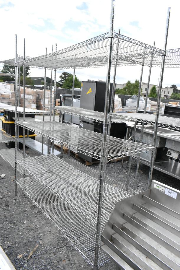 Chrome finish 4-tier wire shelving unit, sturdy construction, industrial use, buyer must dismantle, consider freight charges.