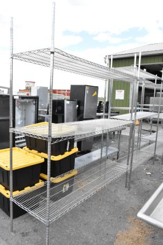 Chrome finish 3 tier wire shelving unit, sturdy and spacious, outdoor setting. Buyer must dismantle for shipping.