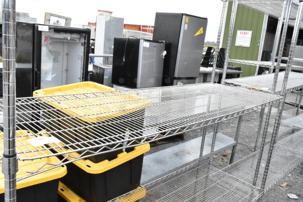 Chrome finish 3-tier wire shelving unit, good condition. Buyer must dismantle. Consider freight charges.