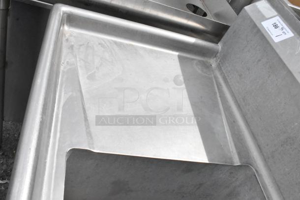 Stainless steel 3 bay sink with dual drain boards, clean condition, slight surface wear. Marked with label: "1861 / 1".