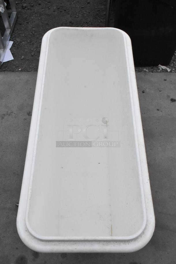 White poly ingredient bin with commercial casters, durable, with some visible wear, ideal for easy ingredient transport.