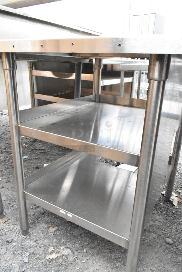 Stainless steel commercial soda station with under shelves, featuring durable construction and ample storage space.
