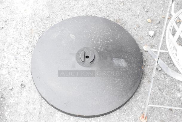 Lot of 2 table base feet plates and 1 top base piece, black, circular metal, showing minor wear, suitable for stable support.