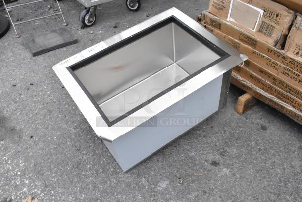 Regency 600DIIB1824 stainless steel drop-in ice bin, new condition, with visible brand label on the rim.