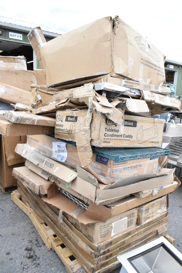 Stack of damaged boxes containing Regency 24" x 72" green epoxy wire shelves and Steelton 24" x 60" chrome shelf kits.